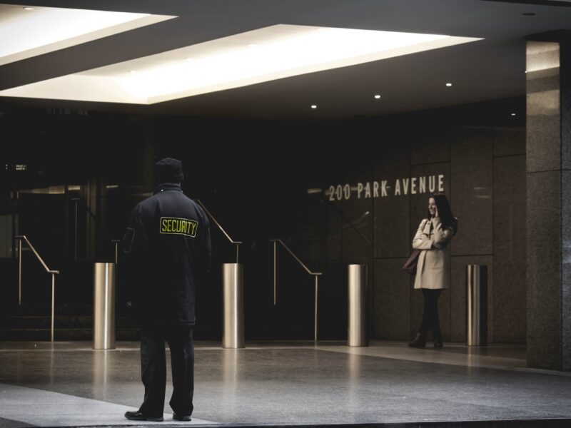 security guard standing on the gray floor