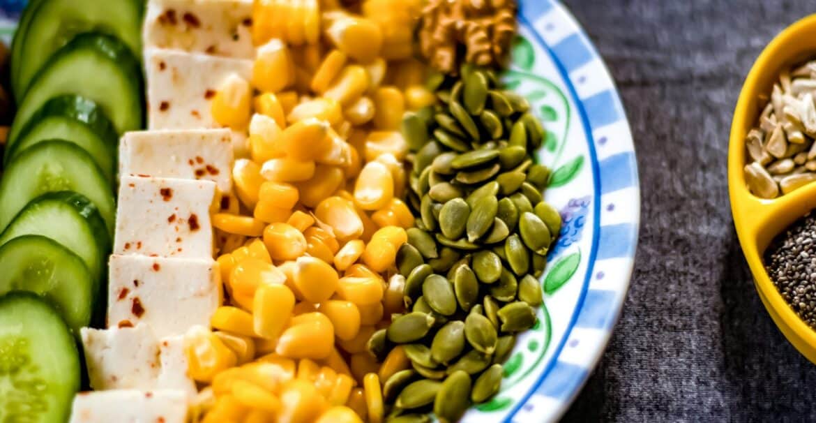 yellow corn on white and blue ceramic plate