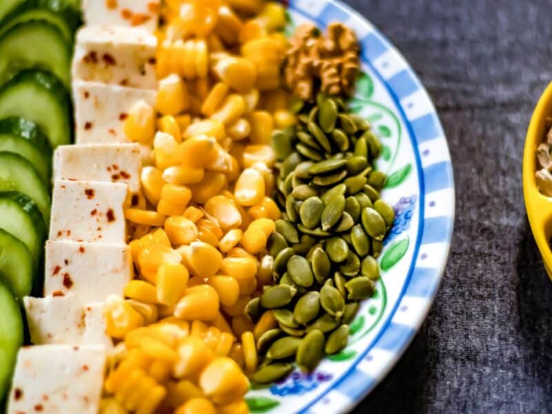 yellow corn on white and blue ceramic plate