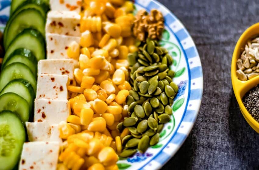 yellow corn on white and blue ceramic plate